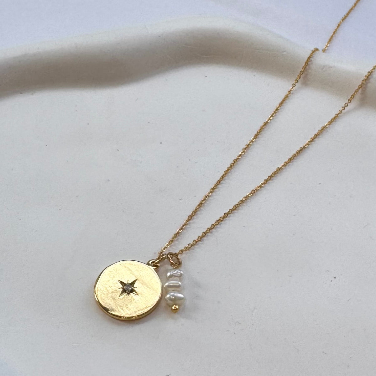 Colar estrela pérola
