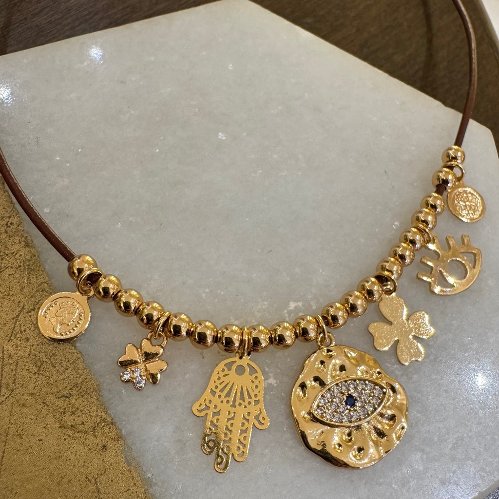 Colar mix pingentes olho grego